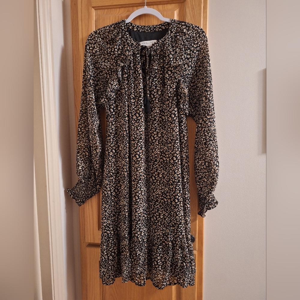 Knee Length Woman"s V Neck Dress  With Tie & Ruffles. Easy For Traveling Too.